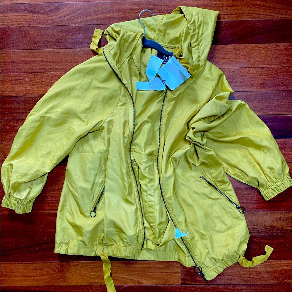 Rain coat in a duffle. NWT